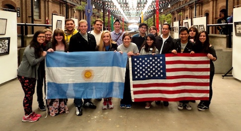 group of students holding flags